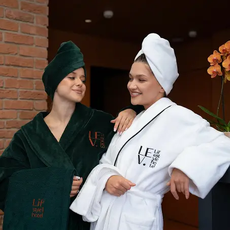 Гості у брендованих халатах LEV. Lifestyle Hotel